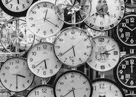 Black And White Photo Of Clocks